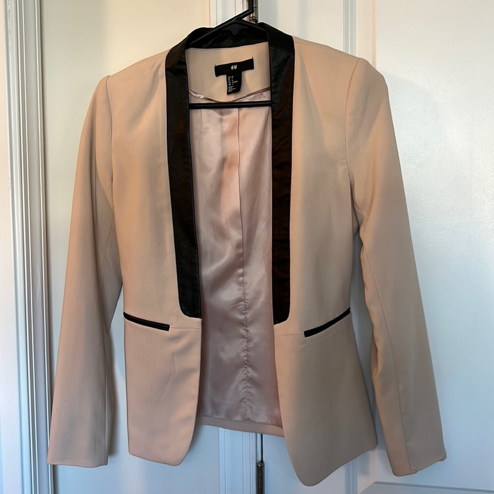 Pale pink blazer with faux leather details